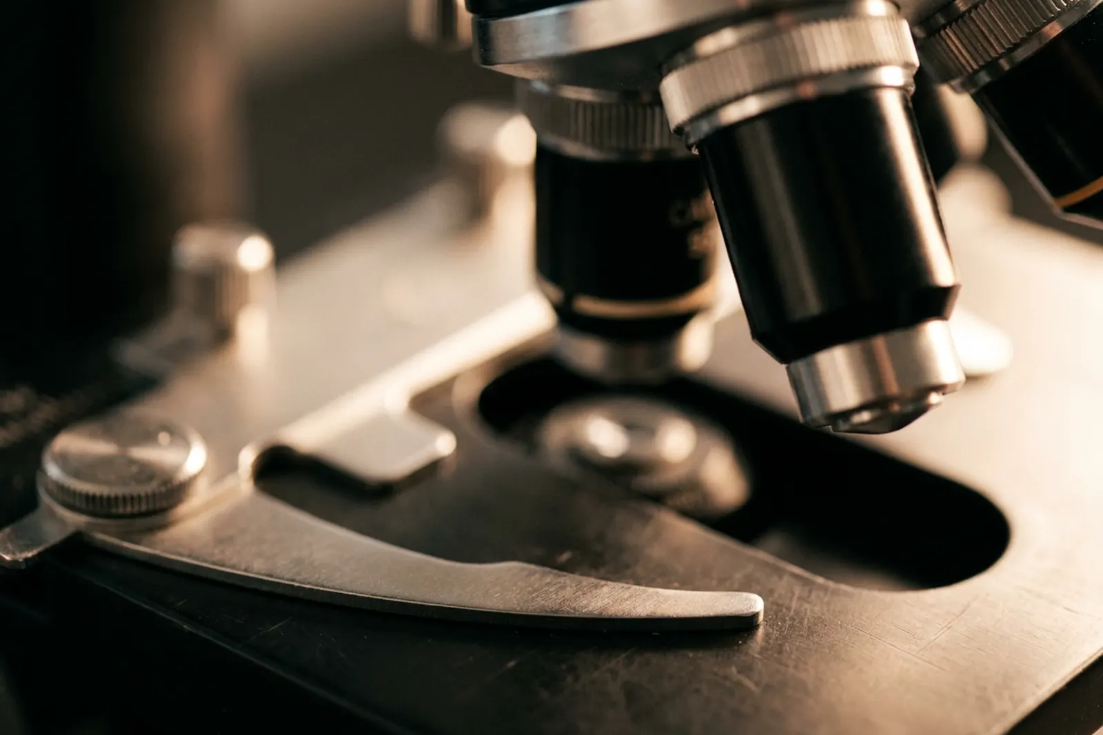 Close detail of a surgical microscope's polished optics